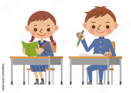 教室の机で勉強する中学生（高校生）男女