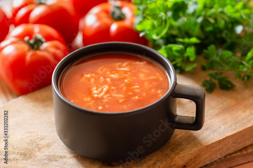 Obraz na plátně Tomato soup with rice in a dish