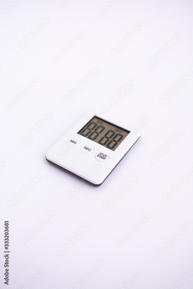 mini digital lcd counter timer kitchen alarm clock, count down clock for cooking, on white background mini digital lcd counter timer kitchen alarm clock, count down clock for cooking, on white background