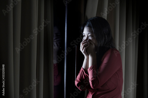 Tableau sur toile young beautiful scared and depressed Asian Chinese woman feeling overwhelmed and