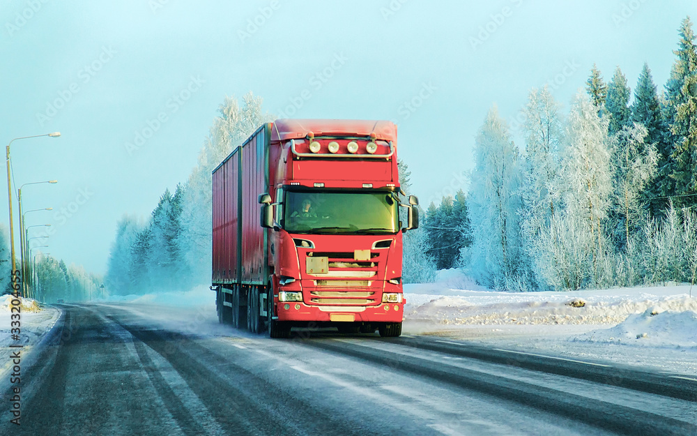 Lorry on road in winter Rovaniemi reflex