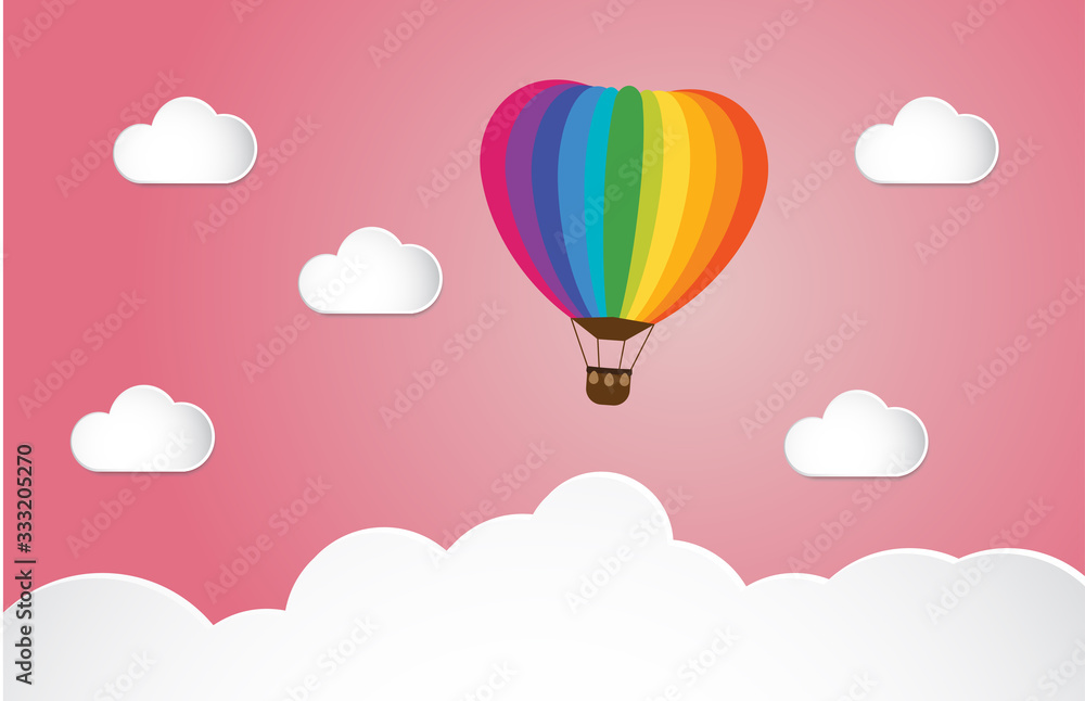 Fototapeta premium Origami made colorful hot air balloon fly over grass.paper art style.
