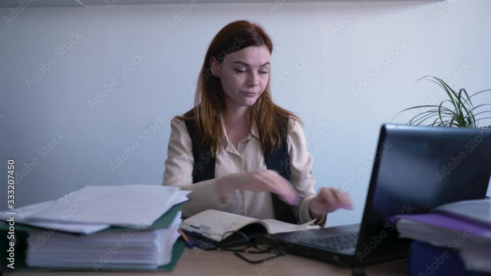 tired at work, depression worker working on laptop, businessman tired of many reports, sitting in the office at the computer, working overtime tired at work, depression worker working on laptop, businessman tired of many reports, sitting in the office at the computer, working overtime
