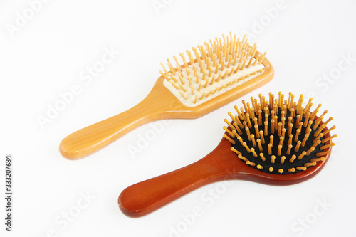 wooden massage comb with cloves for combing hair