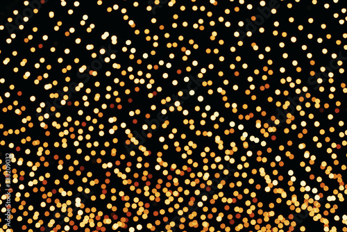 Background of Golden  yellow and red lights bokeh background on black sky.