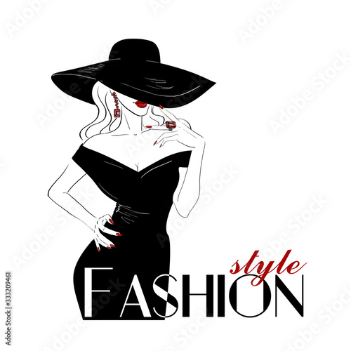 Fashion woman in big hat with red lips