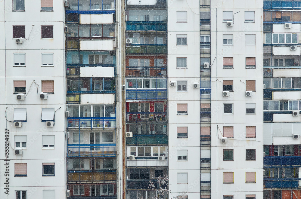 Building with windows and balconies of apartments Building with windows and balconies of apartments