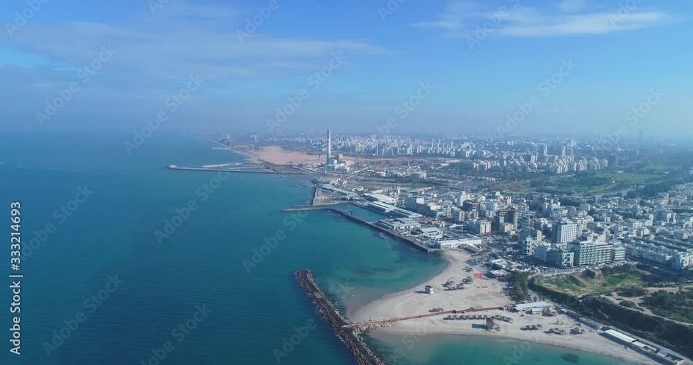 Israel skyline from a drone. Panoramic Aerial view above coastline of Tel Aviv modern and business city with hotels, seashore and beach. Middle east skylines Israel skyline from a drone. Panoramic Aerial view above coastline of Tel Aviv modern and business city with hotels, seashore and beach. Middle east skylines