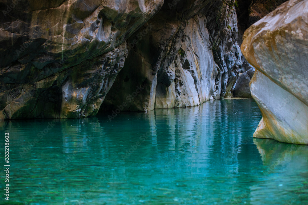 Taroko Pavilion Scenic Area, Hualien, Taiwan, with colorful rock walls and turquoise streams in Shakayu Creek Taroko Pavilion Scenic Area, Hualien, Taiwan, with colorful rock walls and turquoise streams in Shakayu Creek