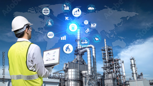 Industry 4.0 of oil and gas refining process of refinery plant, Double exposure of engineer working, Industrial energy system network icons concept. photo