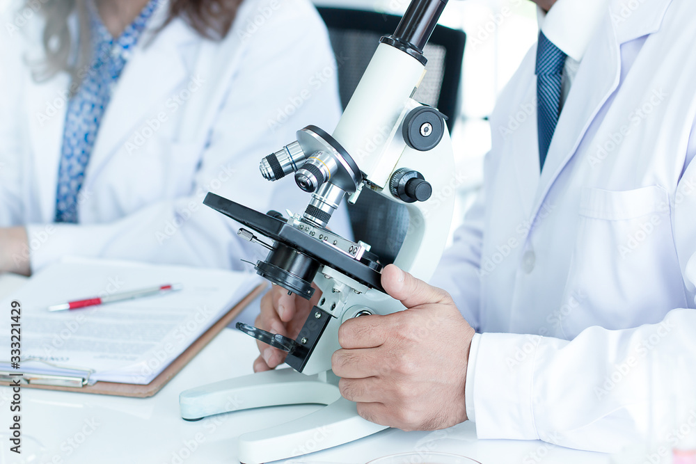 Scientists are researching and recording in science laboratories. Scientists are researching and recording in science laboratories.