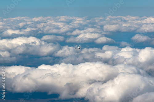 airplanein blue sky © Oleg