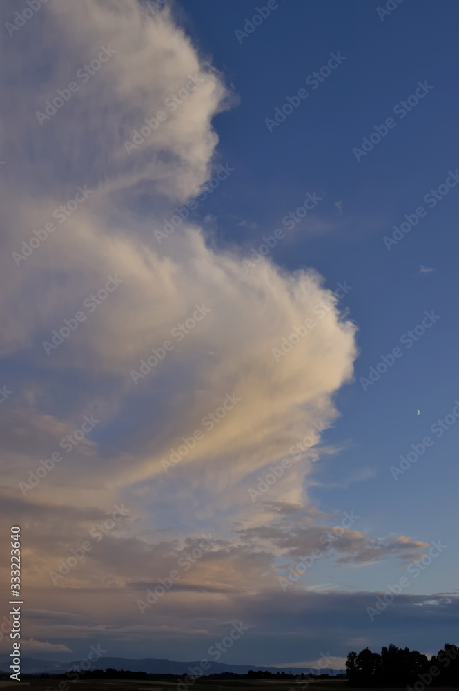 Cirrus (Ci) is a genus of atmospheric cloud generally characterized by thin, wispy strands, giving the type its name from the Latin word cirrus, meaning a ringlet or curling lock of hair. Sunset. Cirrus (Ci) is a genus of atmospheric cloud generally characterized by thin, wispy strands, giving the type its name from the Latin word cirrus, meaning a ringlet or curling lock of hair. Sunset.