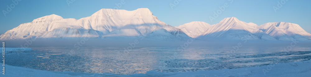 Norway landscape ice nature of the glacier mountains of Spitsbergen, Longyearbyen, Svalbard. Arctic ocean during winter polar day and colorful sunset sky Arctica area, Global warming  Amazing nature 