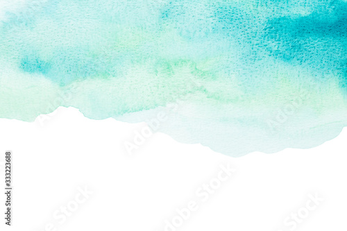 Abstract blue watercolor background. The color splashing on the paper. Hand drawn.