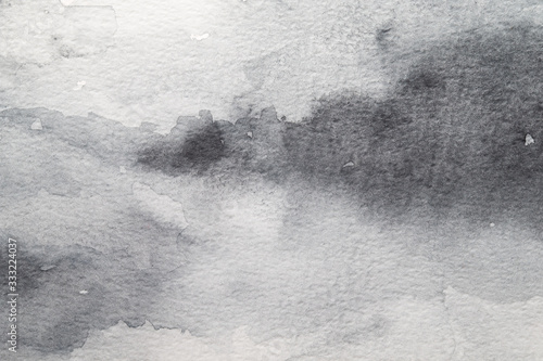 Grey abstract watercolor background. Painting on paper © Pakhnyushchyy