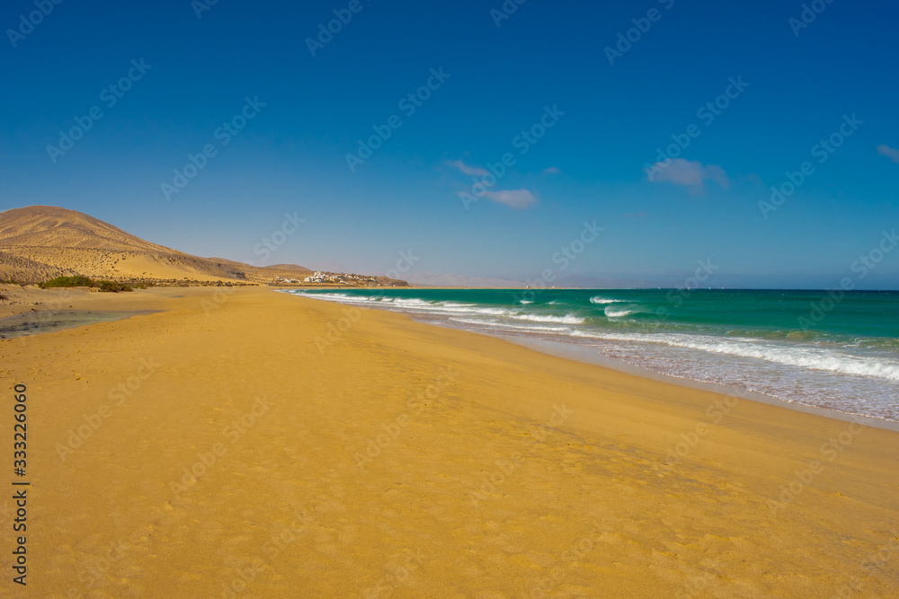 Fuerteventura, Canary Islands, Spain. Beautiful landscape of mountains, beach and coast of Atlantic Ocean 