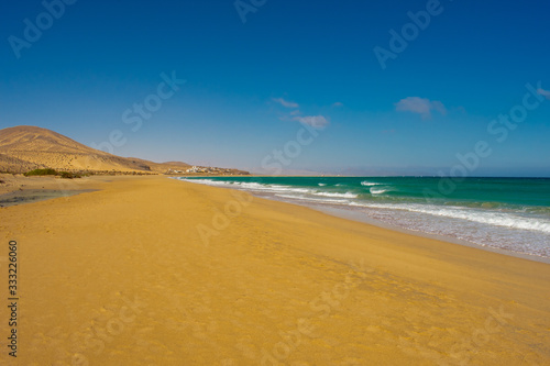 Fuerteventura  Canary Islands  Spain. Beautiful landscape of mountains  beach and coast of Atlantic Ocean 