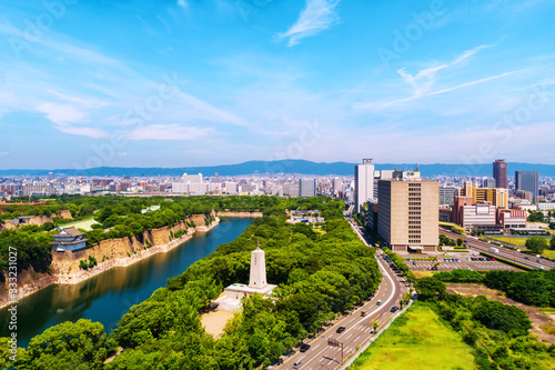 Aerial view of Castle Park in Osaka, Japan with modern skyscrapers