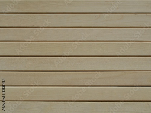  Background from wooden boards, beige color horizontal. Wood texture. Planks of light wood. For the text.