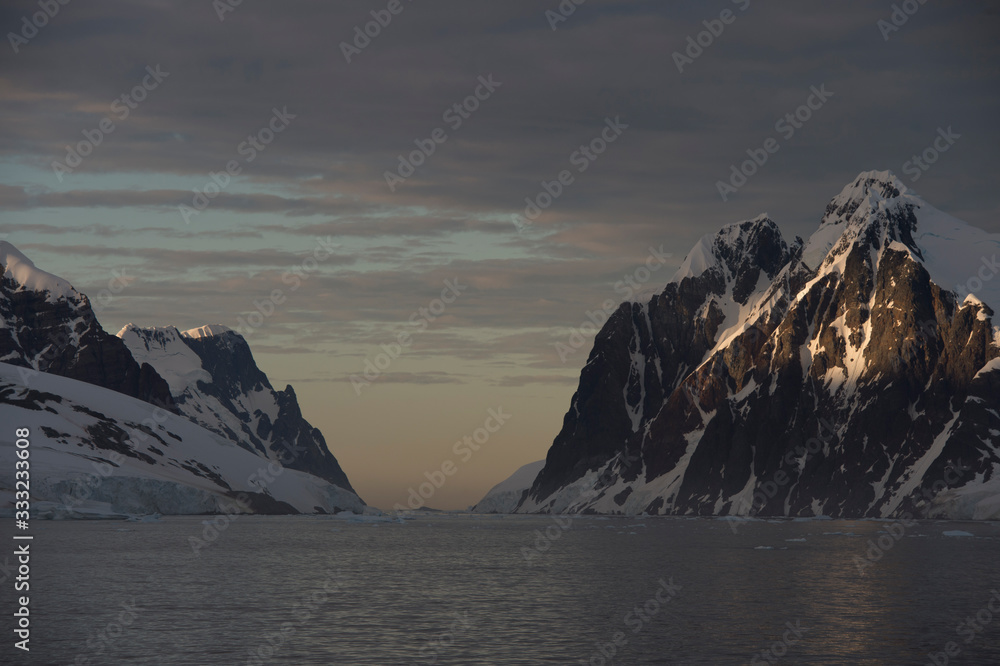 Mountain view from ship at sunset in Antarctica