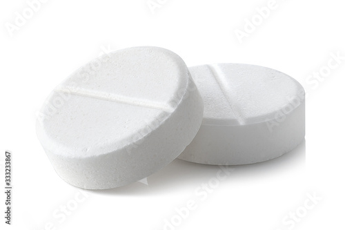 Close-up of two round paracetamol pills