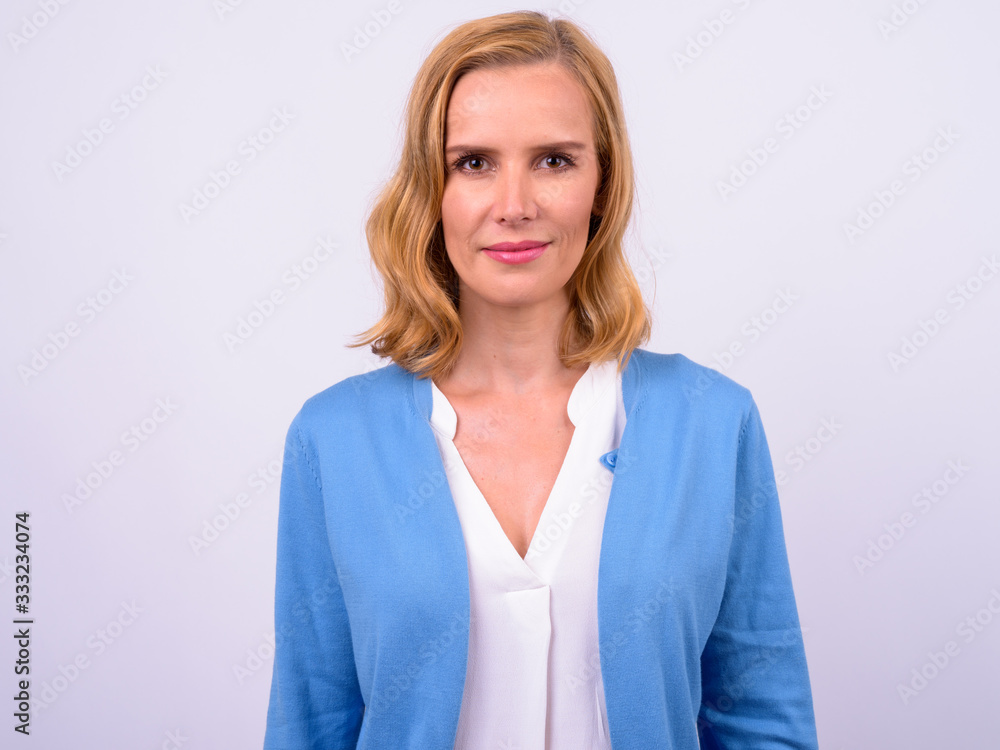 Face of beautiful blonde businesswoman looking at camera Face of beautiful blonde businesswoman looking at camera