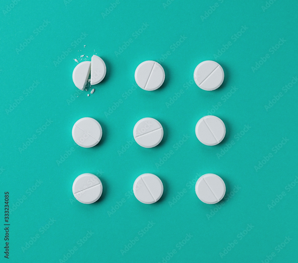 Set of white round medical pills Set of white round medical pills