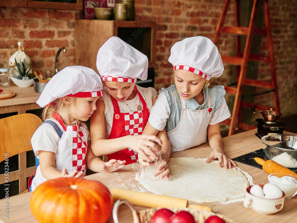Children making cakes.Family time concept. Happy Family cooking. Stay at home Children making cakes.Family time concept. Happy Family cooking. Stay at home