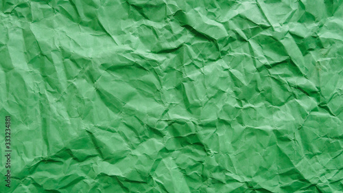 Wallpaper Mural Crumpled green recycled paper, abstract background, copy space. Torontodigital.ca