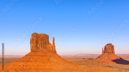 Beautiful sunset over famous Buttes of Monument Valley on the border between Arizona and Utah, USA