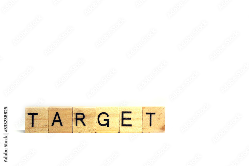 Target word wooden object isolated white background and copy space - Goal and Destination concept Target word wooden object isolated white background and copy space - Goal and Destination concept