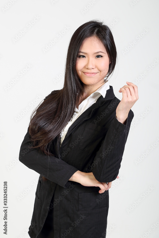 One young asian malaysian business office woman stand pose smile on white background One young asian malaysian business office woman stand pose smile on white background
