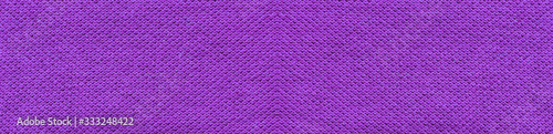 Violet texture background, empty plain seamless fabric design. Simple cloth texture, horizontal banner backdrop with blank copy space to use for advertising
