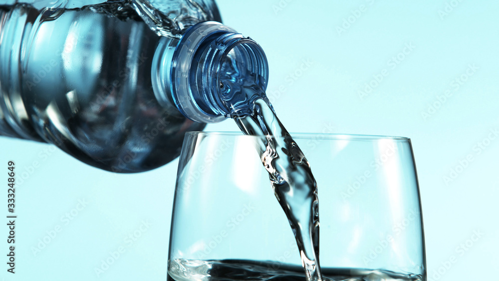 Freeze motion of pouring water from plastic bottle Freeze motion of pouring water from plastic bottle