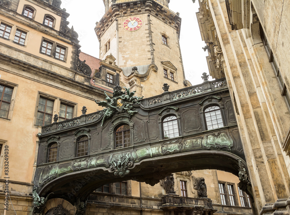 Baroque style architecture of Old sky bridge between the Dresden Castle and the Cathedral in Old town area.