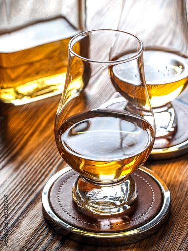 Two glencairn glasses of whisky photo