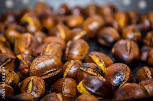 Roasting chestnuts on a stove after returning from walk trough the woods.