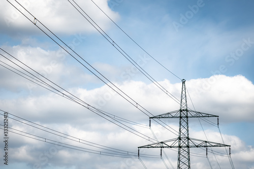 Wallpaper Mural An electrical tower under a cloudy sky Torontodigital.ca