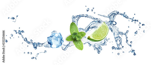 Ice cubes, mint leaves and lime on a white