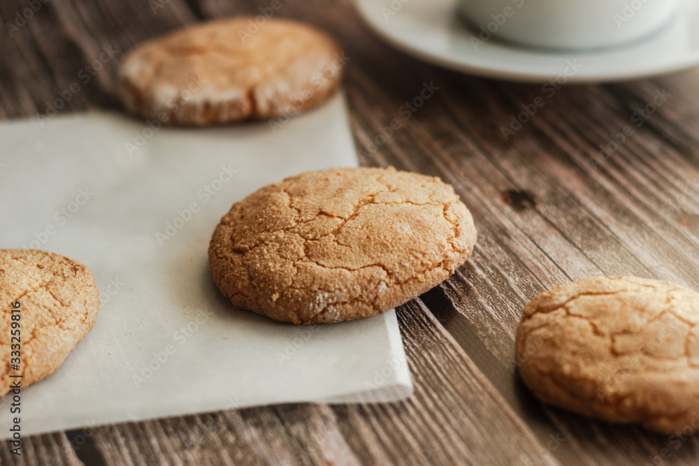 Almond cookies on the wood table. Romantic composition Almond cookies on the wood table. Romantic composition