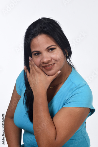 portrait of a woman on white background,front view hand on face