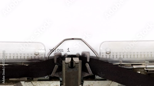 Typing a greeting text to whom it may concern on a vintage typewriter. Business professional salutations concept