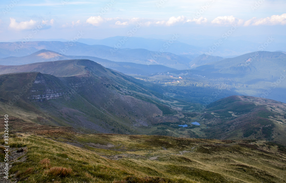 Picturesque scenic panorama view against the background of high mountain ranges blue lakes and beautiful beech forests, Svydovets ridge, Carpathian, Ukraine Picturesque scenic panorama view against the background of high mountain ranges blue lakes and beautiful beech forests, Svydovets ridge, Carpathian, Ukraine