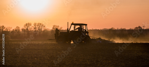 tractor plowing the field