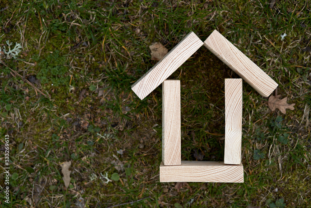 Wooden blocks in a shape of a house can be used as copy space or use for concepts Wooden blocks in a shape of a house can be used as copy space or use for concepts