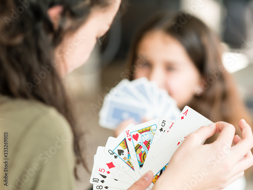 Wallpaper Mural girl playing with cards Torontodigital.ca