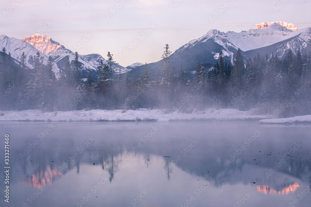 Purple foggy winter sunrise at Vermilion Lakes, Banff National Park, Canadian Rockies, Alberta, Canada Purple foggy winter sunrise at Vermilion Lakes, Banff National Park, Canadian Rockies, Alberta, Canada