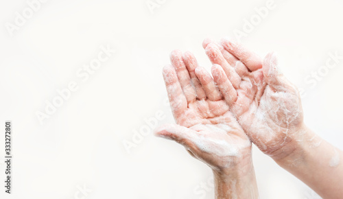 The baby's soap hands on a light background.Clean hand concept idea. © Jane_S