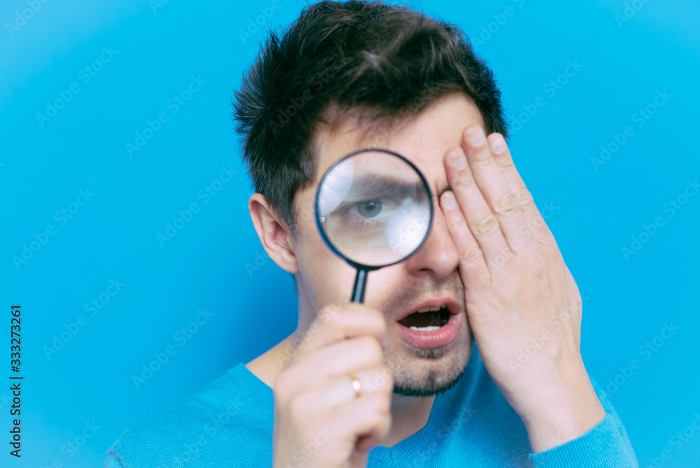 The man with a magnifier The man with a magnifier